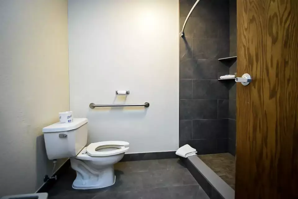 The spacious bathroom and shower area.
